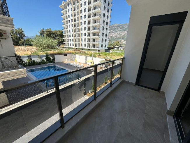 DENİZE 600 METRE 1+1 EŞYASIZ SATILIK DAİRE