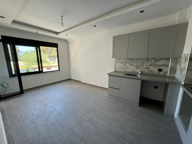 DENİZE 600 METRE 1+1 EŞYASIZ SATILIK DAİRE