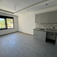 DENİZE 600 METRE 1+1 EŞYASIZ SATILIK DAİRE