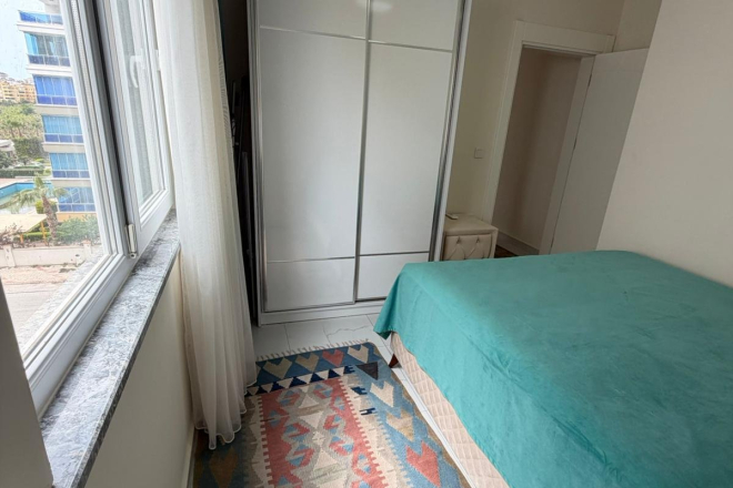 Квартира 1+1 в Махмутларе — мебель, бассейн, сауна и 400 м до моря
