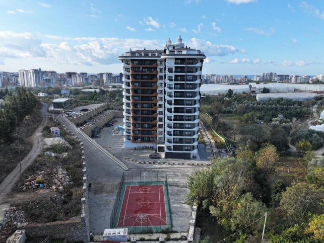 Квартира 1+1 в Махмутларе — новый комплекс 2023 года, мебель, бассейны и цена 65 000 €