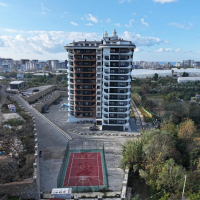 Квартира 1+1 в Махмутларе — новый комплекс 2023 года, мебель, бассейны и цена 65 000 €