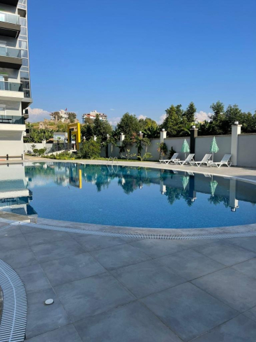 MAHMUTLARDA DENİZE 500 mt. 1+1 EŞYALI SATILIK DAİRE