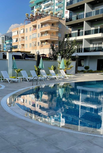 MAHMUTLARDA DENİZE 500 mt. 1+1 EŞYALI SATILIK DAİRE