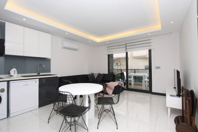 Купить квартиру 1+1 в центре Алании — мебель, бассейн, 97 000 €