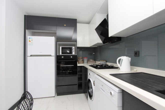 Купить квартиру 1+1 в центре Алании — мебель, бассейн, 97 000 €