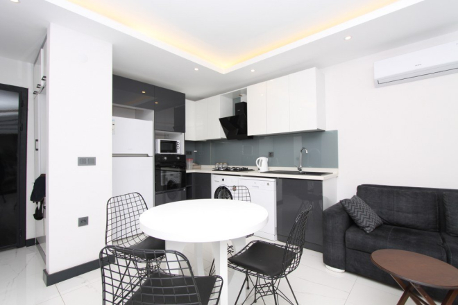 Купить квартиру 1+1 в центре Алании — мебель, бассейн, 97 000 €