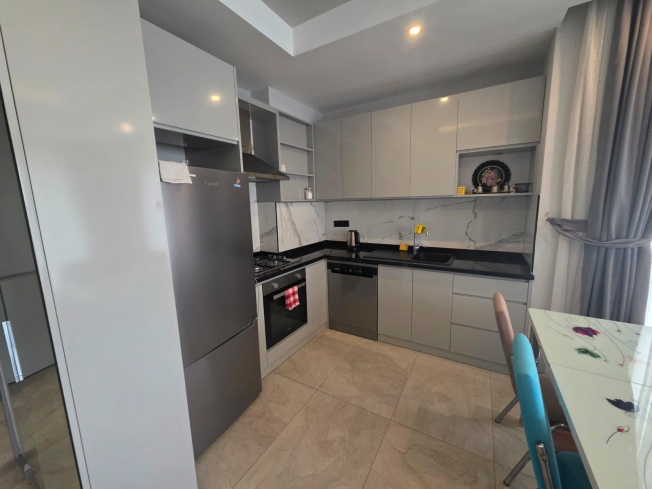 MODERN, GENİŞ VE KALİTELİ BİR YAPIDA 1+1 EŞYALI YAŞAM ALANI
