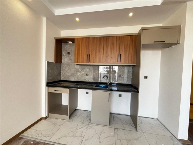 Купить новую квартиру 1+1 с видом на море в Авсалларе — 50 м²