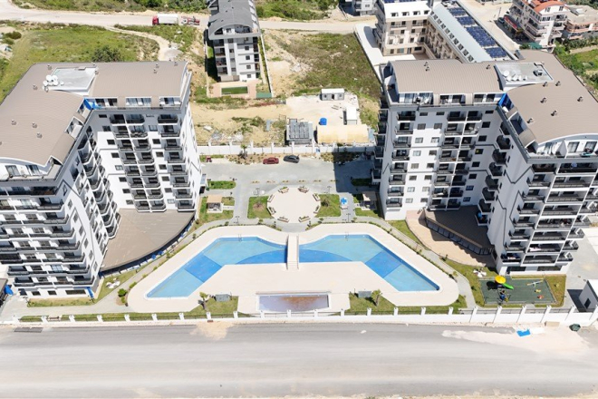 Купить новую квартиру 1+1 с видом на море в Авсалларе — 50 м²