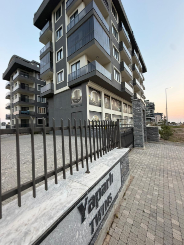 Купить меблированную квартиру 1+1 с видом на море в Каргыджаке — 55 м², 300 м до пляжа