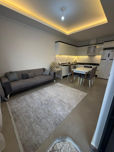 Купить меблированную квартиру 1+1 с видом на море в Каргыджаке — 55 м², 300 м до пляжа