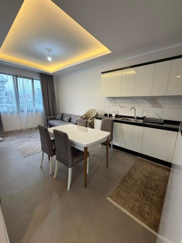 Купить меблированную квартиру 1+1 с видом на море в Каргыджаке — 55 м², 300 м до пляжа