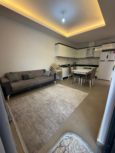Купить меблированную квартиру 1+1 с видом на море в Каргыджаке — 55 м², 300 м до пляжа