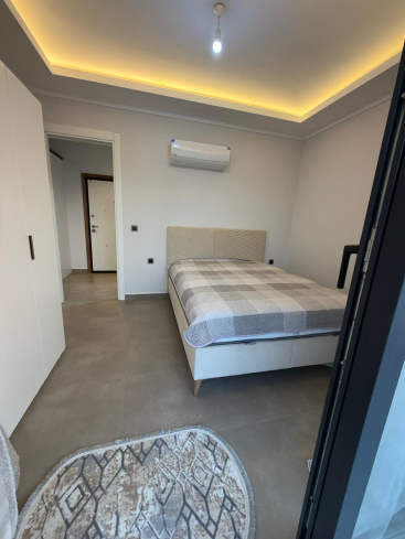 Купить меблированную квартиру 1+1 с видом на море в Каргыджаке — 55 м², 300 м до пляжа