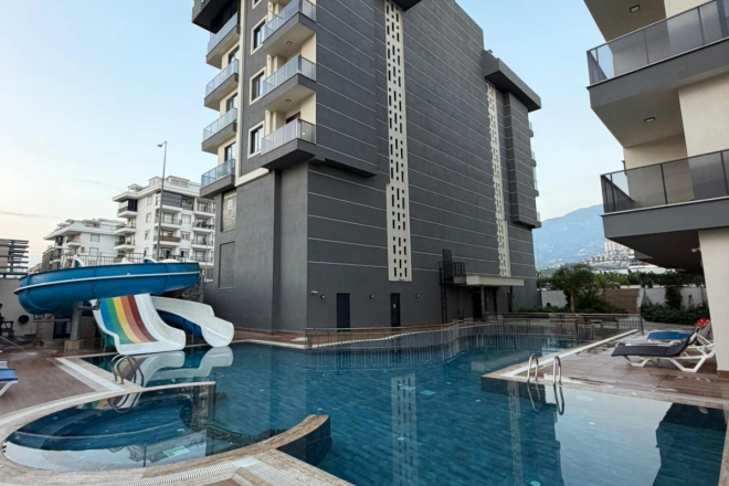 Купить меблированную квартиру 1+1 с видом на море в Каргыджаке — 55 м², 300 м до пляжа