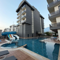 Купить меблированную квартиру 1+1 с видом на море в Каргыджаке — 55 м², 300 м до пляжа