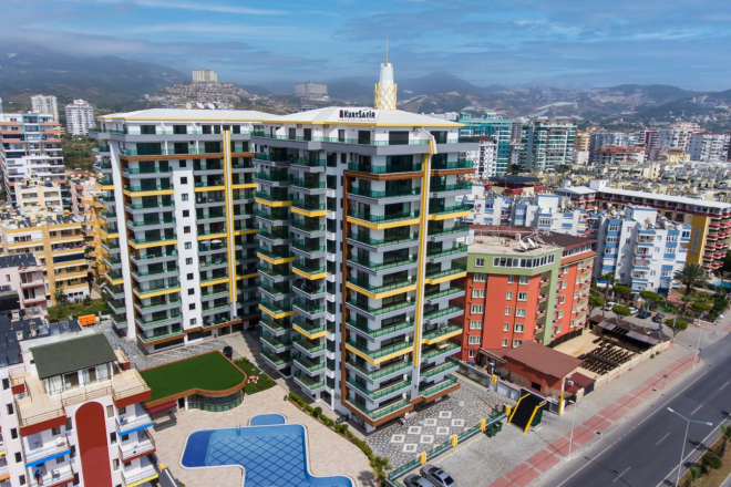 Купить квартиру 1+1 на первой линии в Махмутларе, Алания — 60 м²