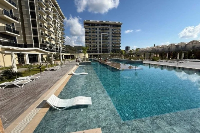 Квартира 1+1 в Демирташе — вид на море, бассейны и спа за 62 000 €